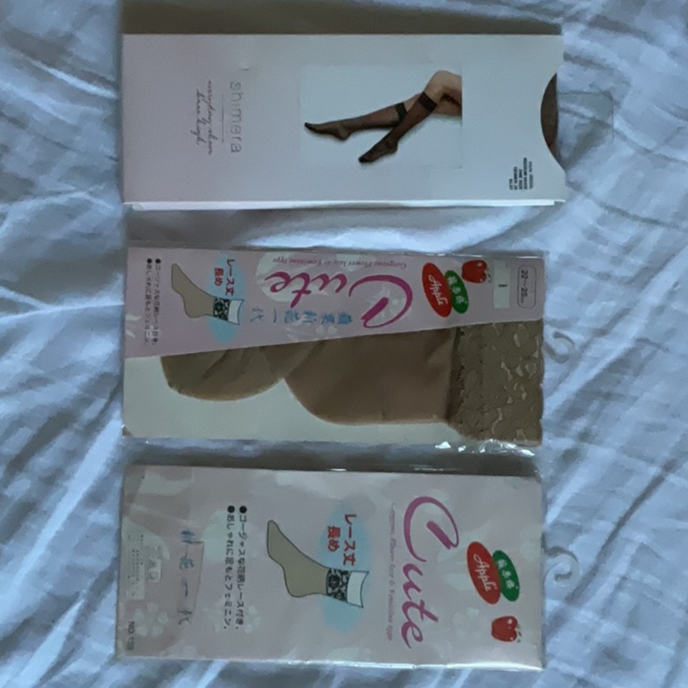 Sheer Black and Beige Tights, three pairs.